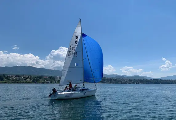A yacht sailing with a spinnaker up