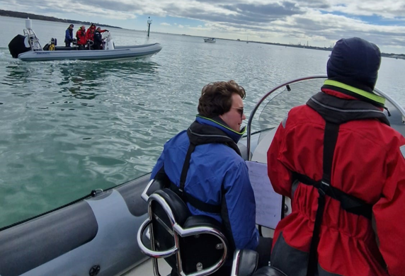 Two rigid inflatable boats (RIBs) with students on a Powerboat course at Ocean Sports Tuition, Southampton