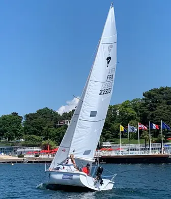 Yacht sailing on the water, used for training at the sailing centre