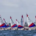 A large group of dinghies along the shoreline of the Queen Mary Sailing Club, Ashford