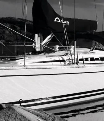 A yacht moored in black and white
