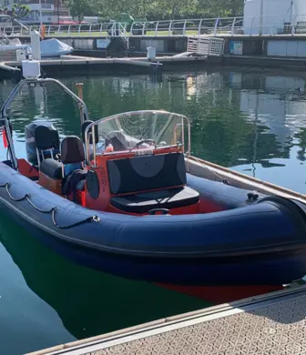 A rib moored in a marina