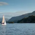 A yacht sailing on Derwent Water lake in the Lake District