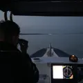 A man sailing at night