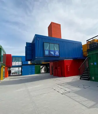 The rearview of the Boxbay Boat Club blue office container